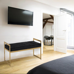Banquette en velours noir avec pieds dorés
