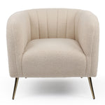 Fauteuil à pieds métal doré et tissu bouclette beige