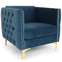 Fauteuil en velours bleu capitonné avec pieds en métal doré