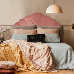 Tête de lit en velours rose 140 cm matelassée