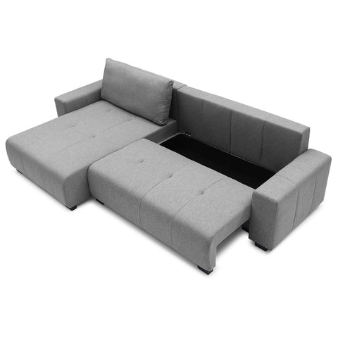 Sofá esquinero convertible Chybel de tela gris