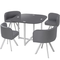 Table carrée en verre avec 4 chaises matelassées grises